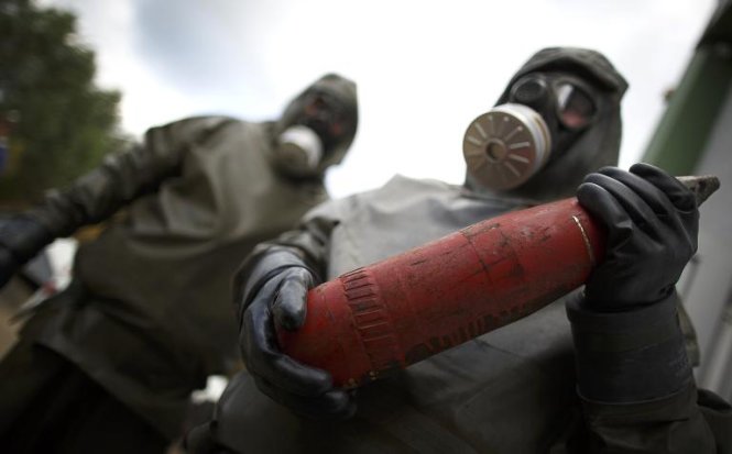 Lực lượng quốc tế hỗ trợ phá hủy vũ khí hóa học ở Syria từ đầu tháng 10-2013 - Ảnh: AFP
