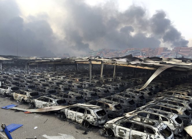 Hàng nghìn xe ô tô tại cảng Thiên Tân đã bị thiêu rụi trong vụ nổ - Ảnh: Reuters