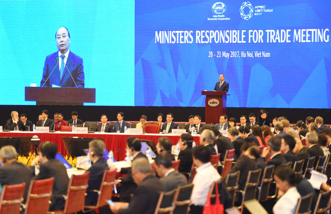 hủ tướng Nguyễn Xuân Phúc phát biểu tại phiên khai mạc Hội nghị Bộ trưởng Thương mại APEC. - Ảnh: VGP