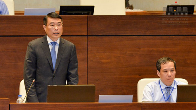 Thống đốc Ngân hàng Nhà nước Lê Minh Hưng tại Quốc hội ngày 7-6 - Ảnh: Quochoi.vn