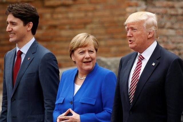 Tổng thống Mỹ Donald Trump (phải), thủ tướng Đức Angela Merkel và thủ tướng Canada Justin Trudeau tại hội nghị G7 ở Sicily, Ý ngày 26-5 - Ảnh: Reuters