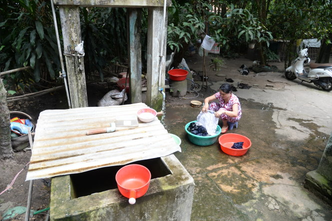 Người dân P.Tân Phú, Q.9 (TP.HCM) sống trong khu quy hoạch dự án mở rộng lâm trại Suối Tiên “treo” hơn 10 năm nay - Ảnh: TỰ TRUNG