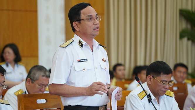 Thiếu tướng Nguyễn Đăng Nghiêm Tổng giám đốc Tân Cảng Sài Gòn báo cáo tình hình kinh doanh, hoạt động của Tân Cảng Sài Gòn - Ảnh: Thuận Thắng