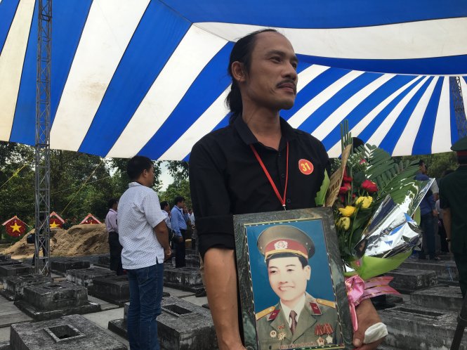 Lễ an táng, truy điệu các liệt sĩ hi sinh tại sân bay Biên Hòa - Ảnh: Hà Mi