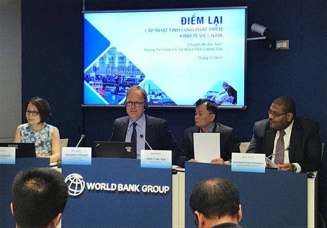 Ngân hàng Thế giới tại Việt Nam tổ chức họp báo công bố báo cáo điểm lại kinh tế Việt Nam tại Hà Nội chiều 13-7 - Ảnh: Q. TR.