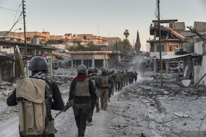 Lính đặc nhiệm của Iraq tiến vào giải phóng Mosul - Ảnh: NYT