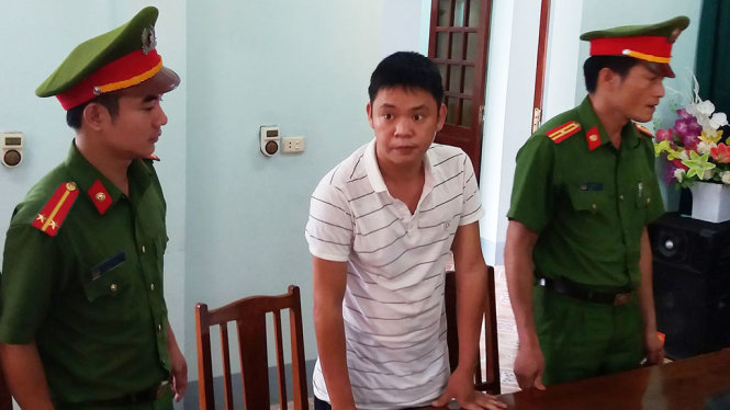 Ông Tình bị Công an huyện Kỳ Sơn, Nghệ An bắt giữ vào sáng 11-8 - Ảnh: LỮ PHÚ
