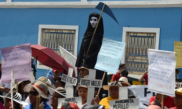 Người dân biểu tình đòi lại chính nghĩa cho cái chết của một nhà hoạt động môi trường ở Honduran. Ảnh: The Guardian
