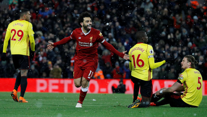 Niềm vui của Salah sau khi hoàn tất cú hat-trick. Ảnh: REUTERS