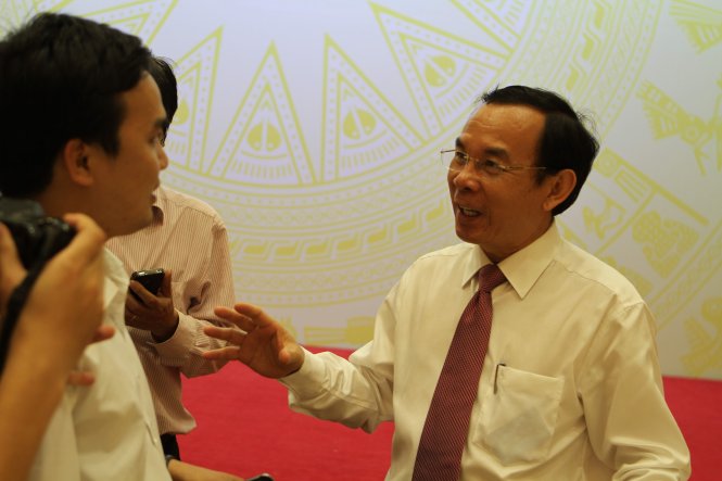 Bộ trưởng Nguyễn Văn Nên trả lời báo chí (V.V.T)