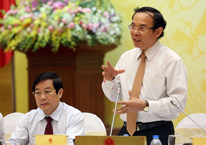 TT - Tại cuộc họp báo chiều 1-4, Bộ trưởng - Chủ nhiệm Văn phòng Chính phủ Nguyễn Văn Nên (phải) đã thông tin về tốc độ tăng GDP quý 1 ước đạt đến 6,03%.