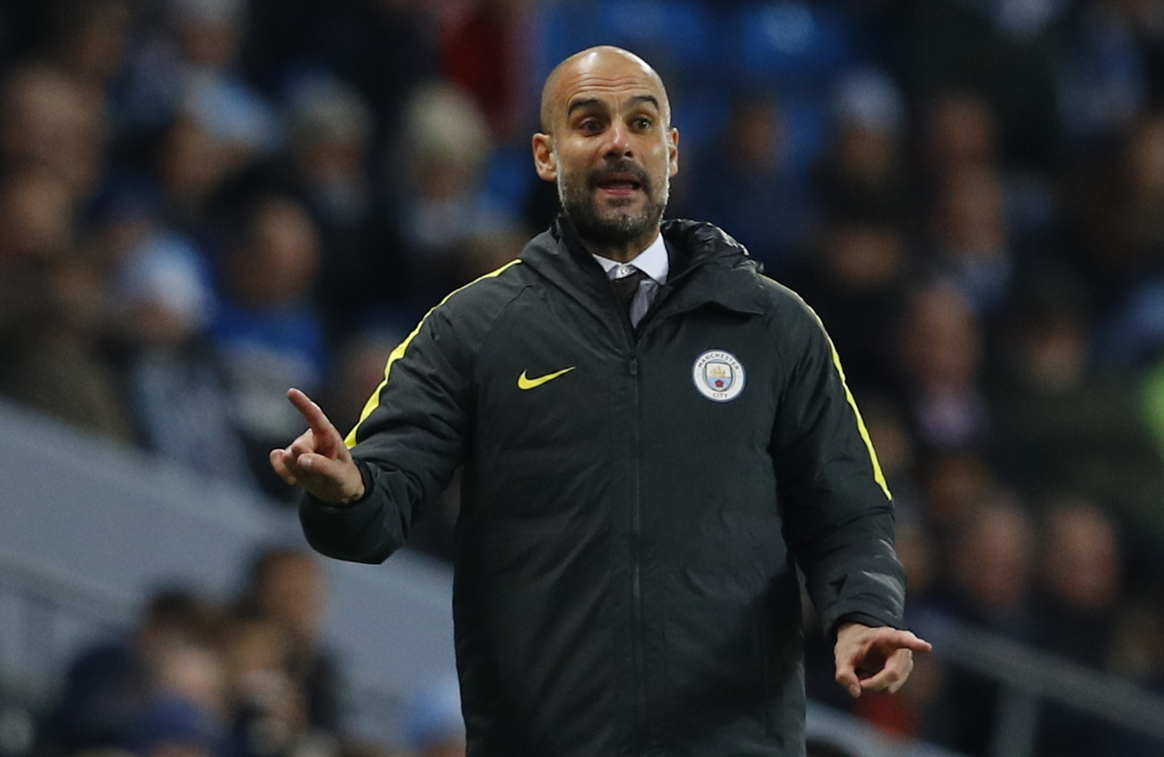 HLV Guardiola sẽ giúp M.C vượt khó trước Arsenal? Ảnh: REUTERS