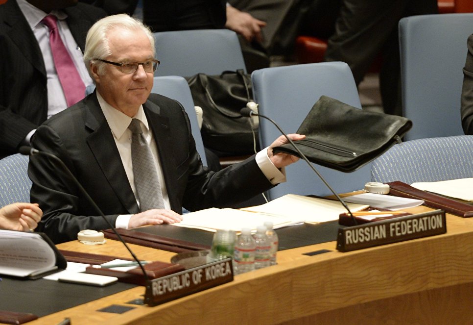 Cố đại sứ Nga tại Liên Hiệp Quốc Vitaly Churkin trong một ngày làm việc - ảnh: AFP