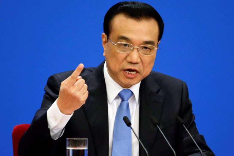 Thủ tướng Trung Quốc Lý Khắc Cường tại buổi họp báo ngày 15-3 ở Bắc Kinh - ảnh: Reuters