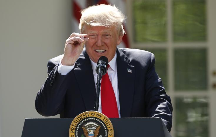 Tổng thống Mỹ Donald Trump phát biểu về quyết định rút khỏi thỏa thuận biến đổi khí hậu ở Nhà Trắng ngày 1-6 - Ảnh: Reuters