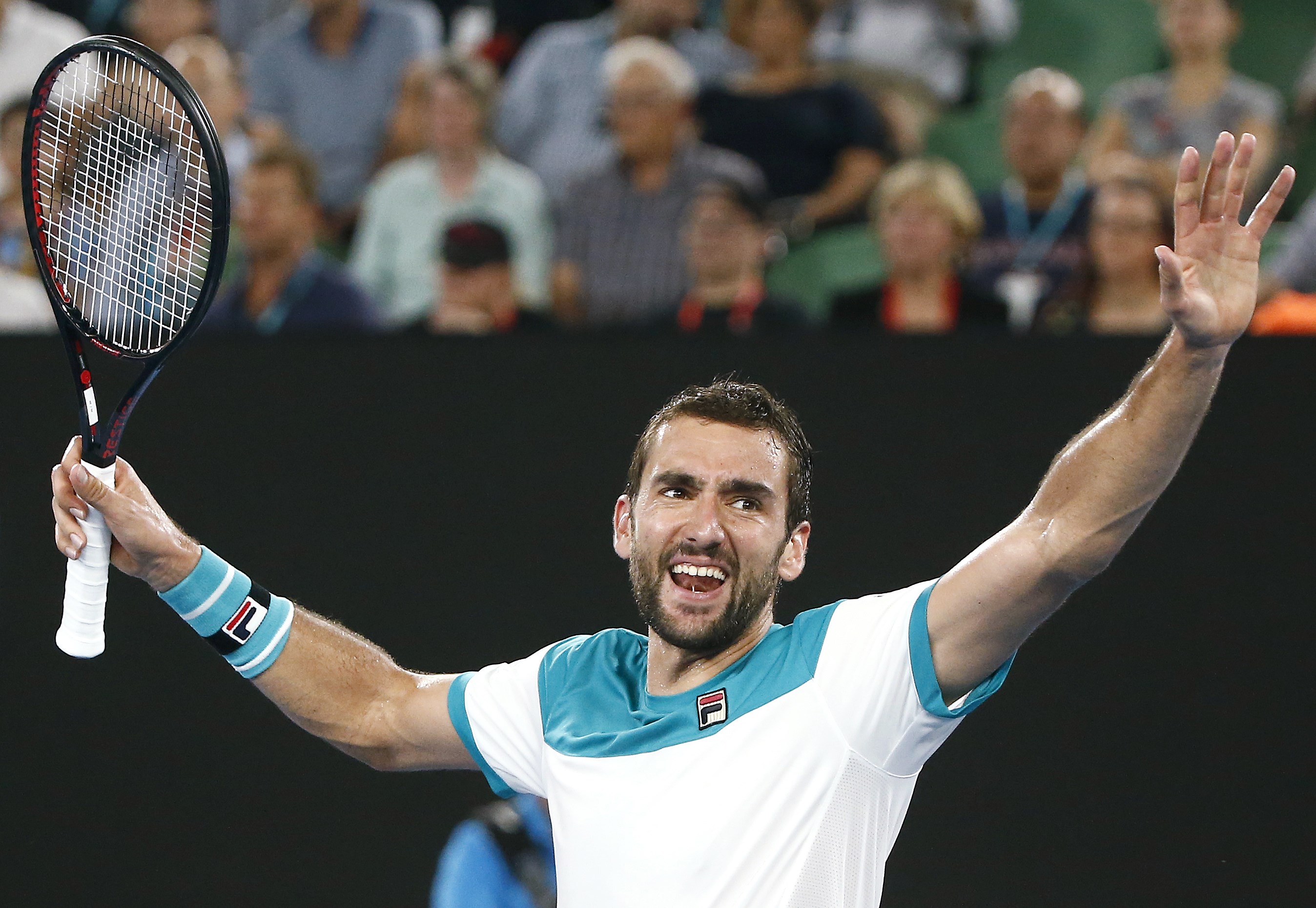 Cilic ăn mừng chiến thắng trước Edmund. Ảnh: REUTERS