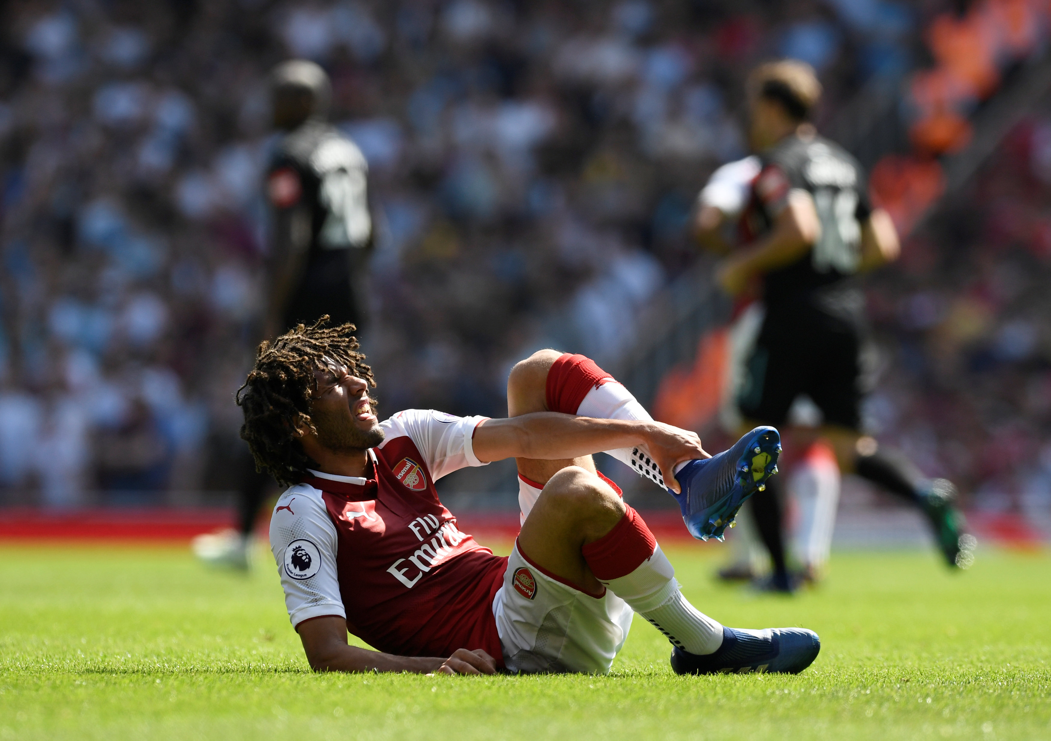 Elneny nghỉ thi đấu 3 tuần vì chấn thương mắt cá. Ảnh: REUTERS